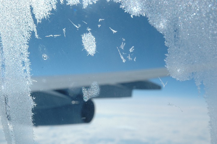 Ice crystals on the airplane window